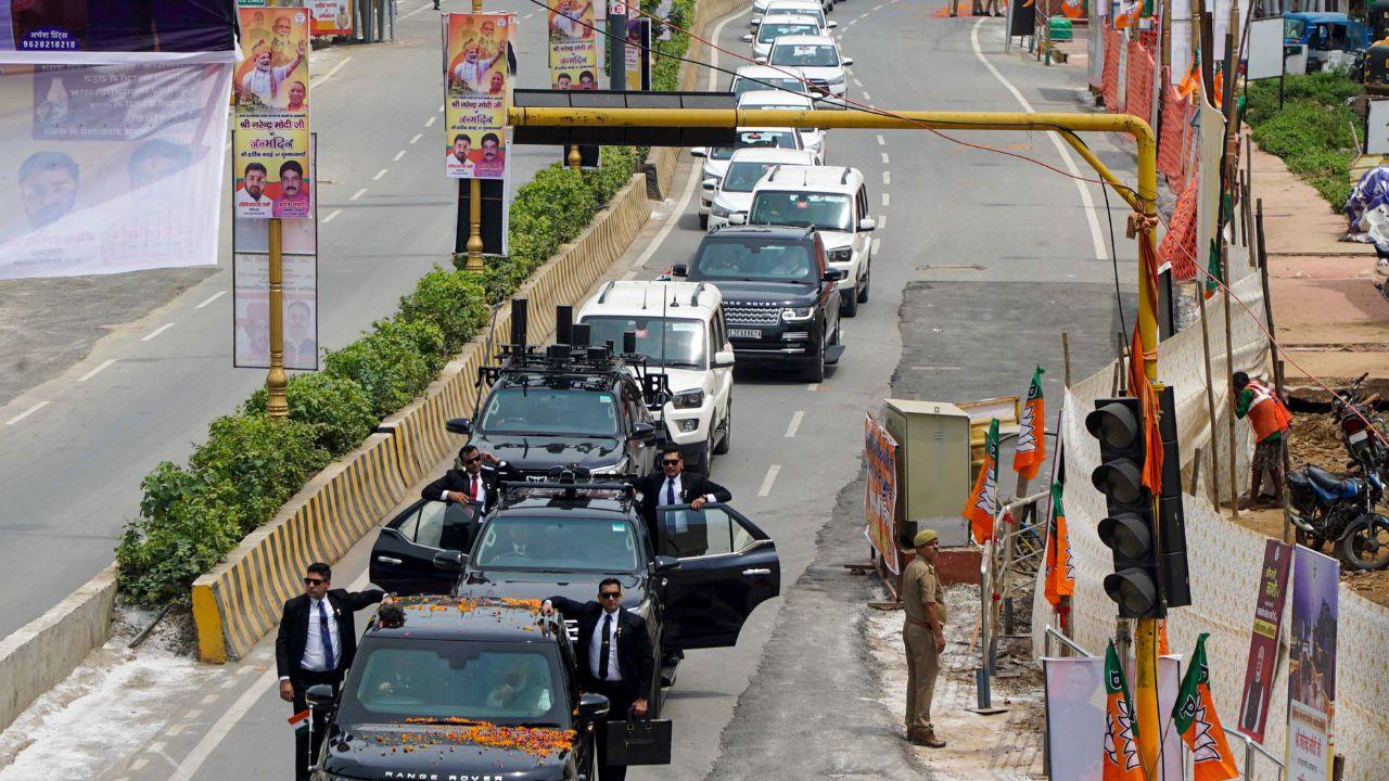 Prime Minister Narendra Modi holds a roadshow on the streets of Varanasi.